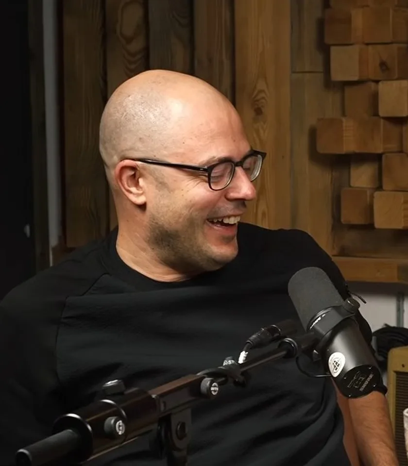 One of the two Doppelgänger hosts laughing