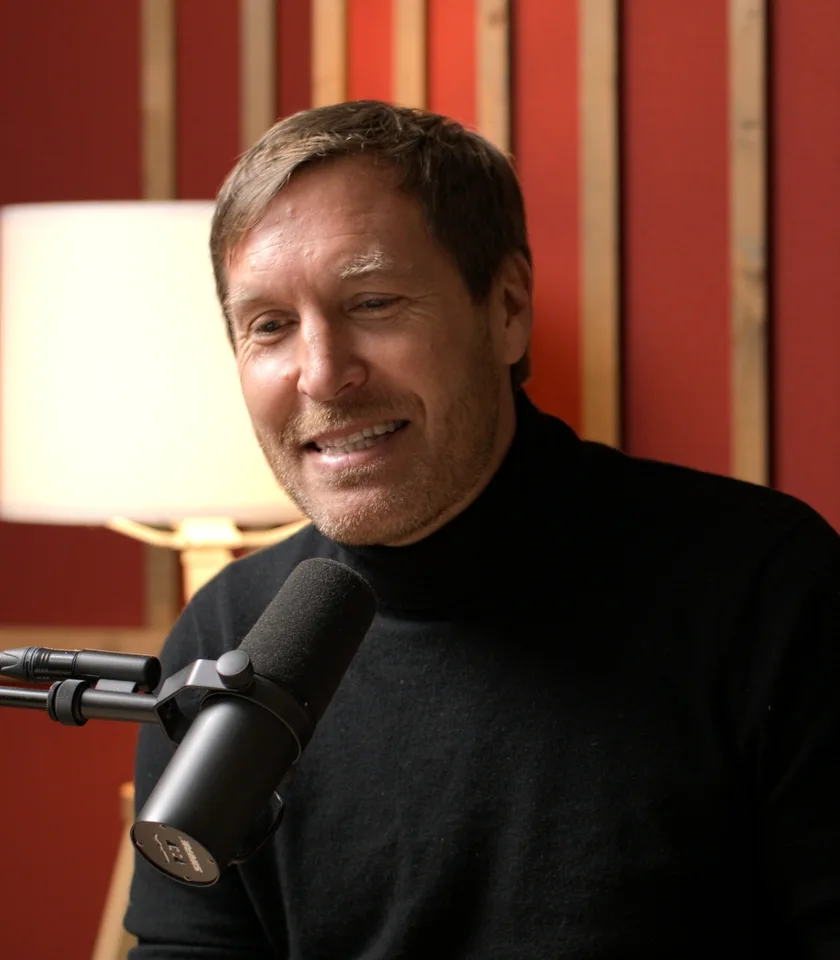Tim Schumacher laughs